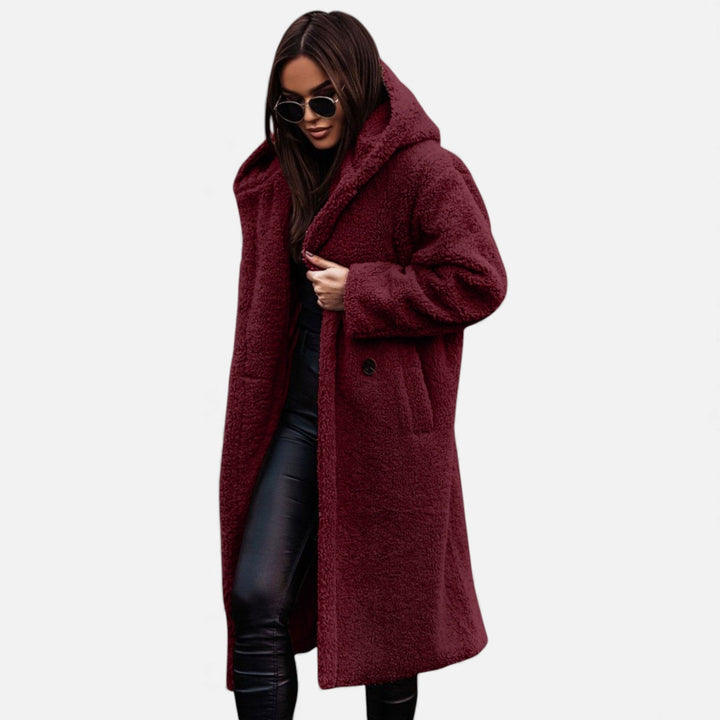 Women's stylish longline winter coat. Elegant outerwear for warmth, sophistication & autumn/winter fashion.