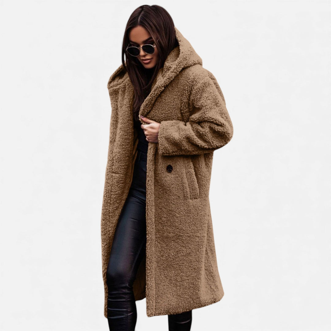 Women's winter fashion longline coat. Elegant, warm & stylish outerwear for sophisticated cold days.