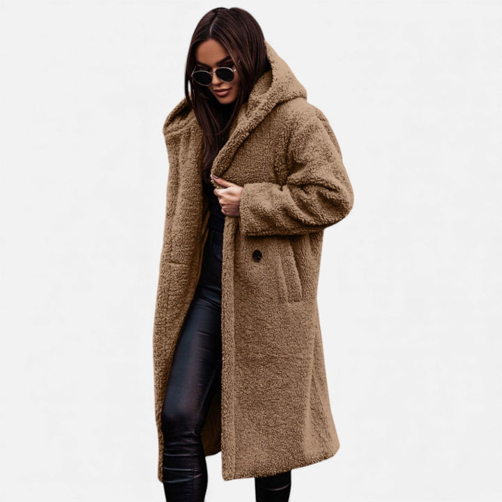 Women's winter fashion longline coat. Elegant, warm & stylish outerwear for sophisticated cold days.