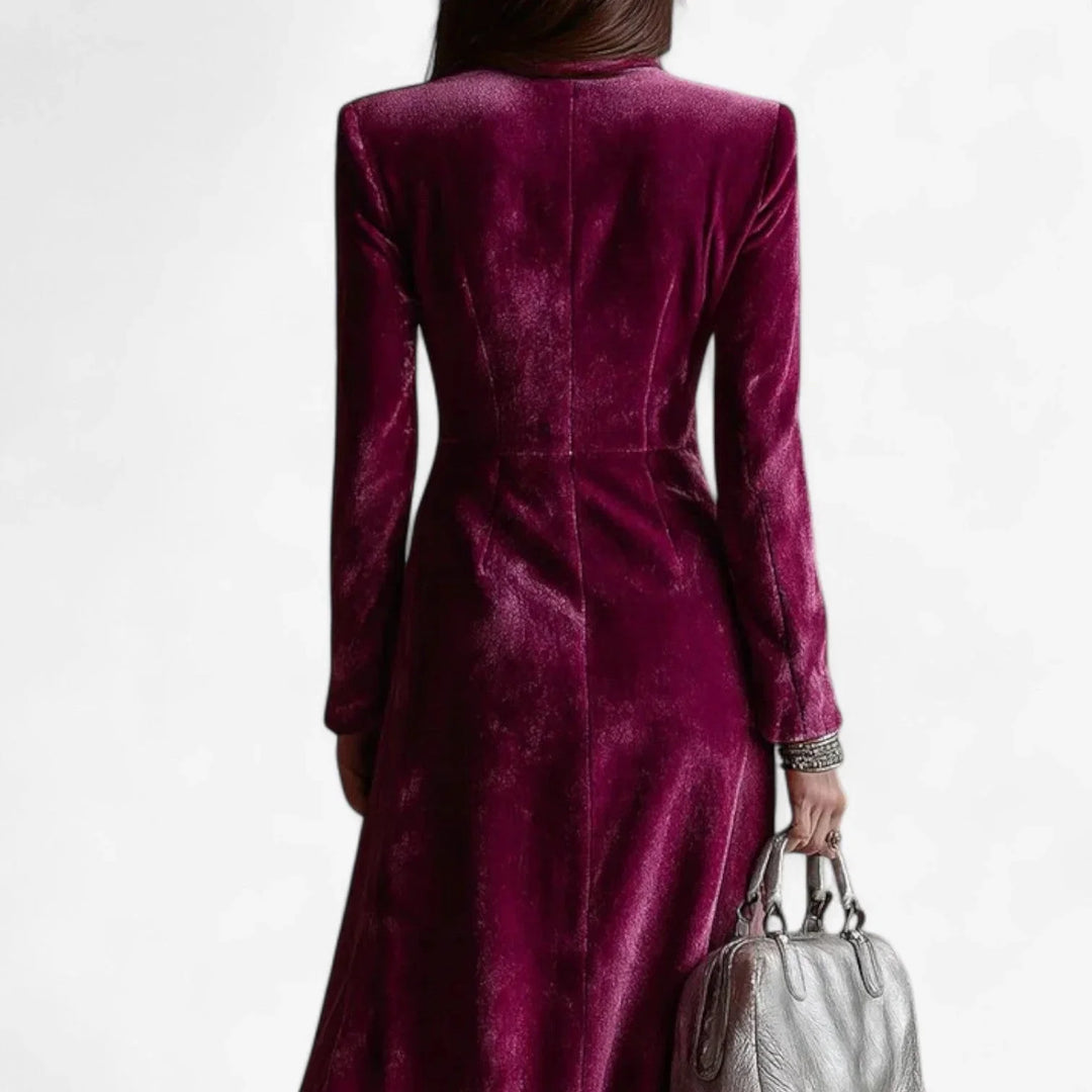 Women's glamorous velvet midi dress, magenta hue, double-breasted with lapel collar and alluring side slit. Evening wear.