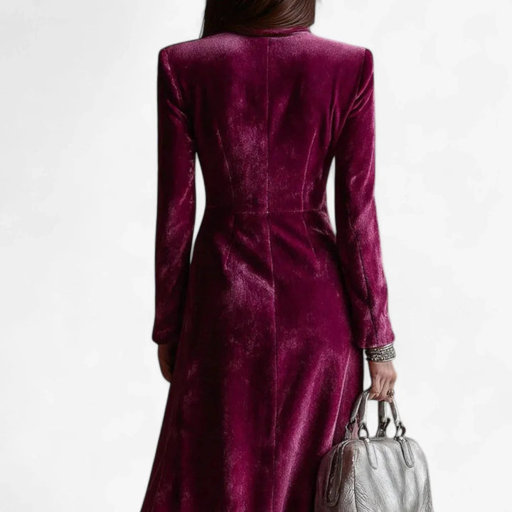 Women's glamorous velvet midi dress, magenta hue, double-breasted with lapel collar and alluring side slit. Evening wear.