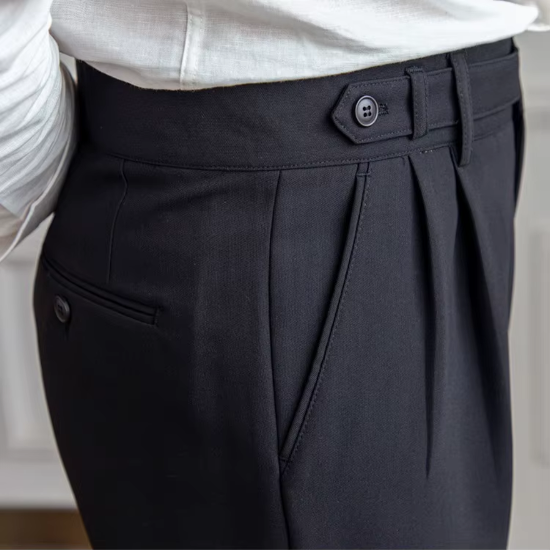 Navy men's pleated dress trousers, essential for a sophisticated modern business casual wardrobe.