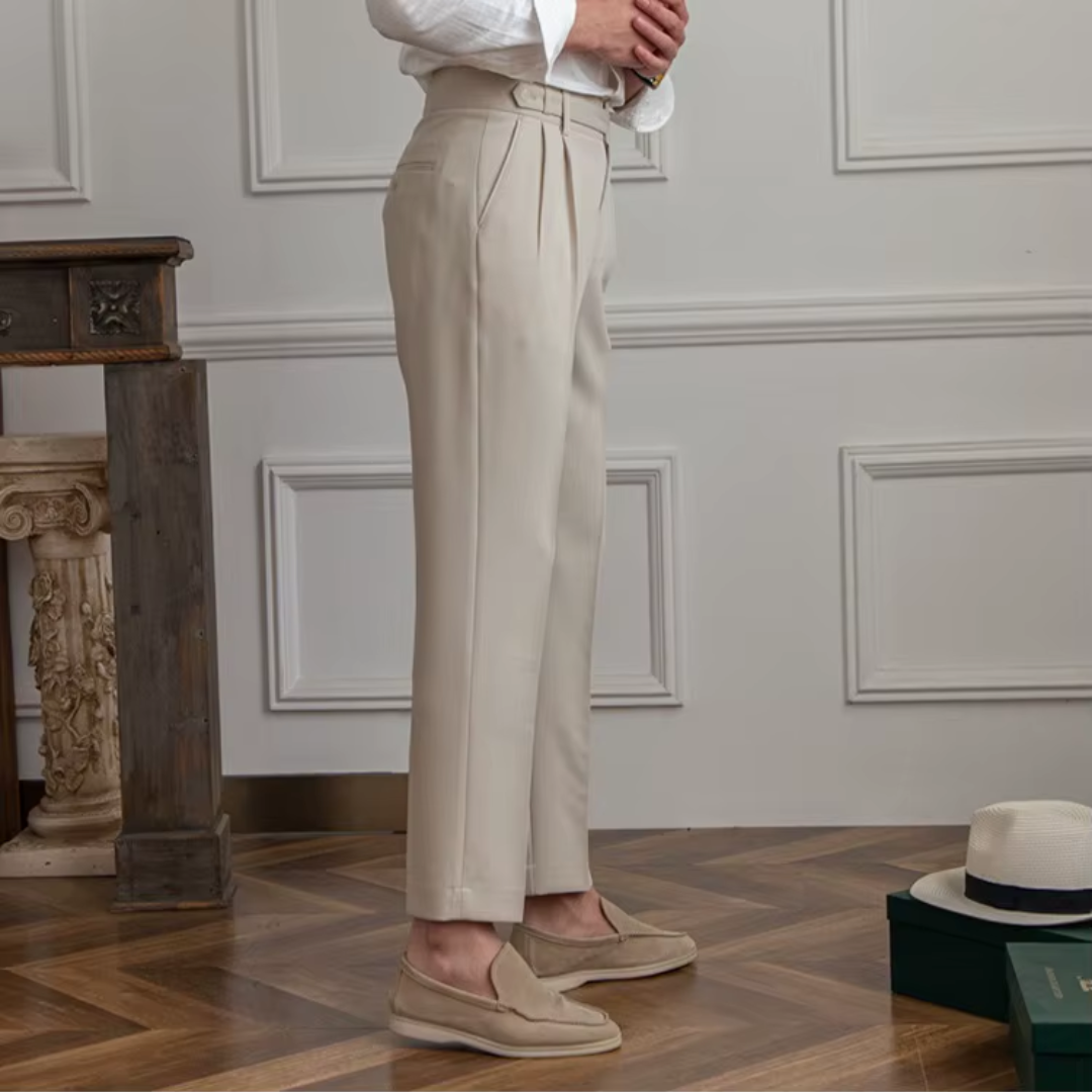 Modern men's chino trousers with stylish pleats, offering a sophisticated and contemporary look.