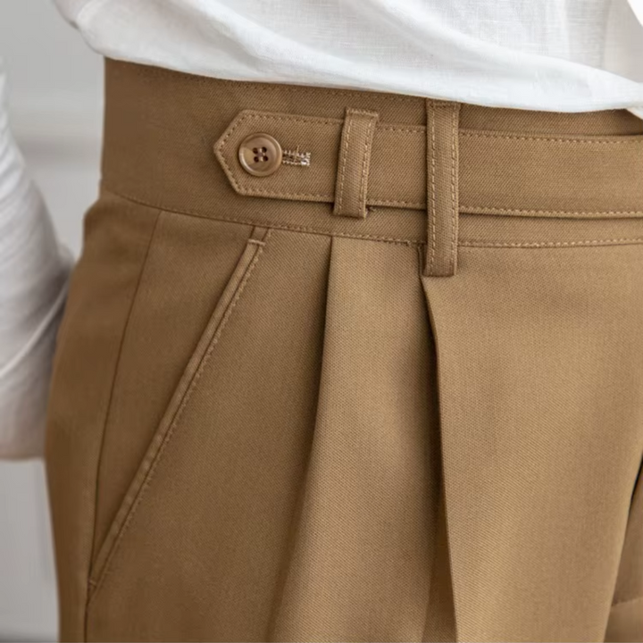Fashion-forward men's pleated trousers, defining modern elegance for contemporary outfits.