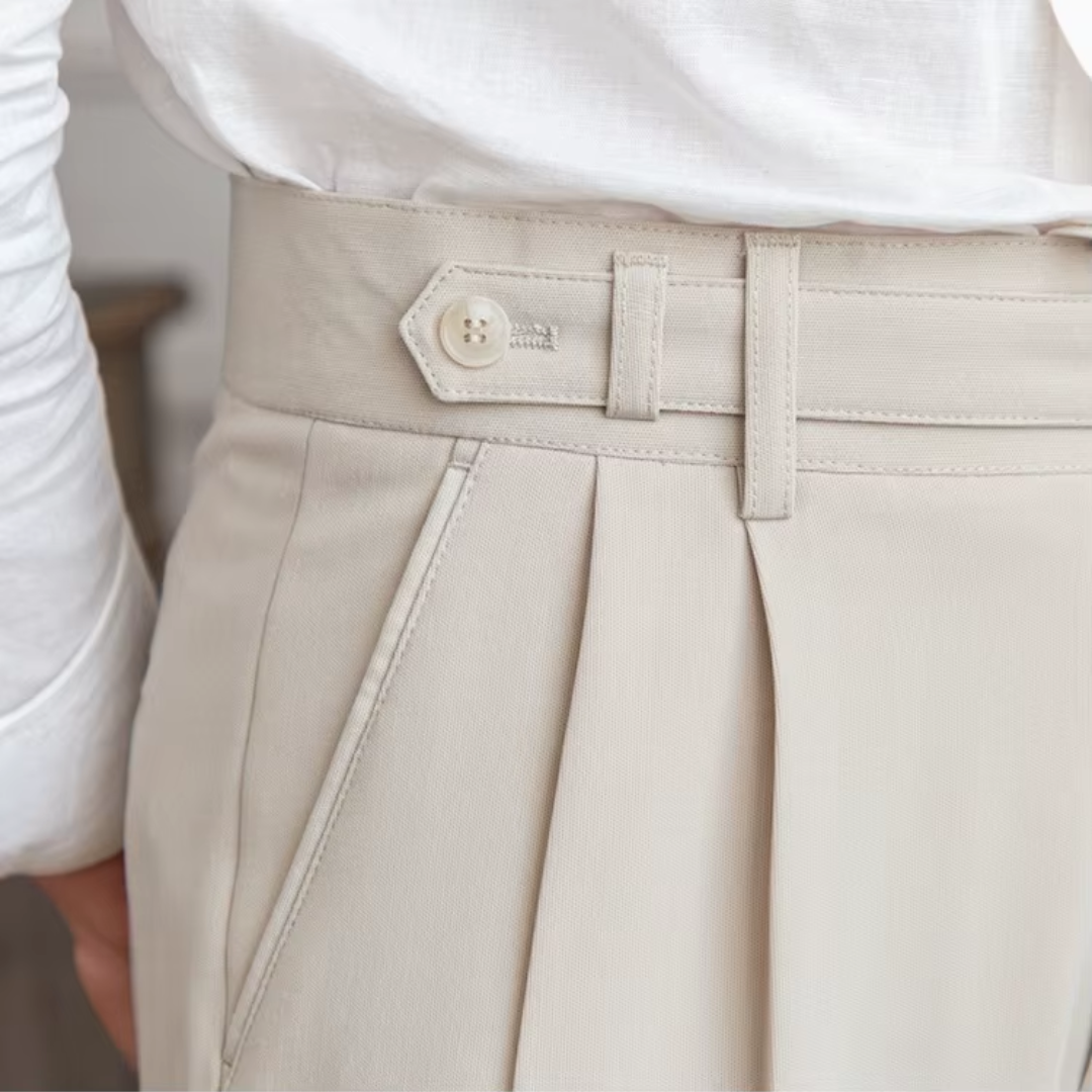 Smart men's pleated dress trousers for business casual settings, combining comfort and elegance.