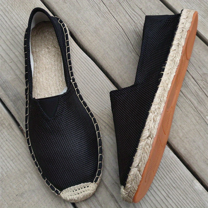 Elegant men's espadrilles, providing comfortable slip-on footwear & stylish fashion for summer travel.