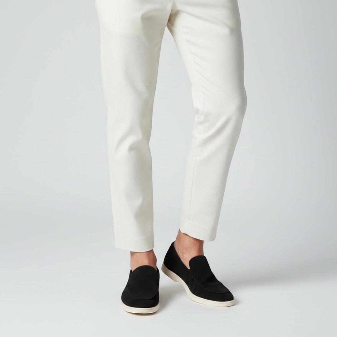 Men's casual slip-on loafers in a light color, perfect for relaxed yet smart summer footwear fashion.