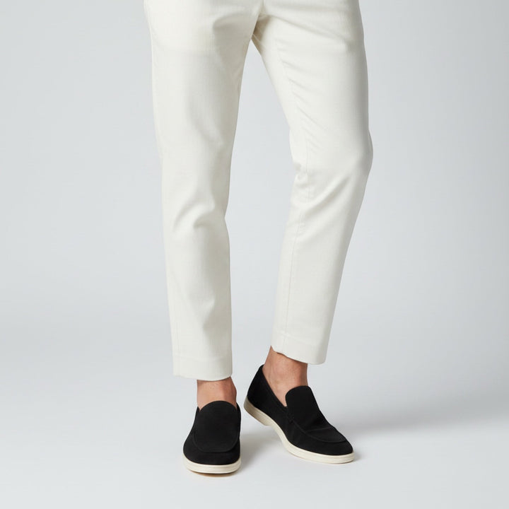 Men's casual slip-on loafers in a light color, perfect for relaxed yet smart summer footwear fashion.