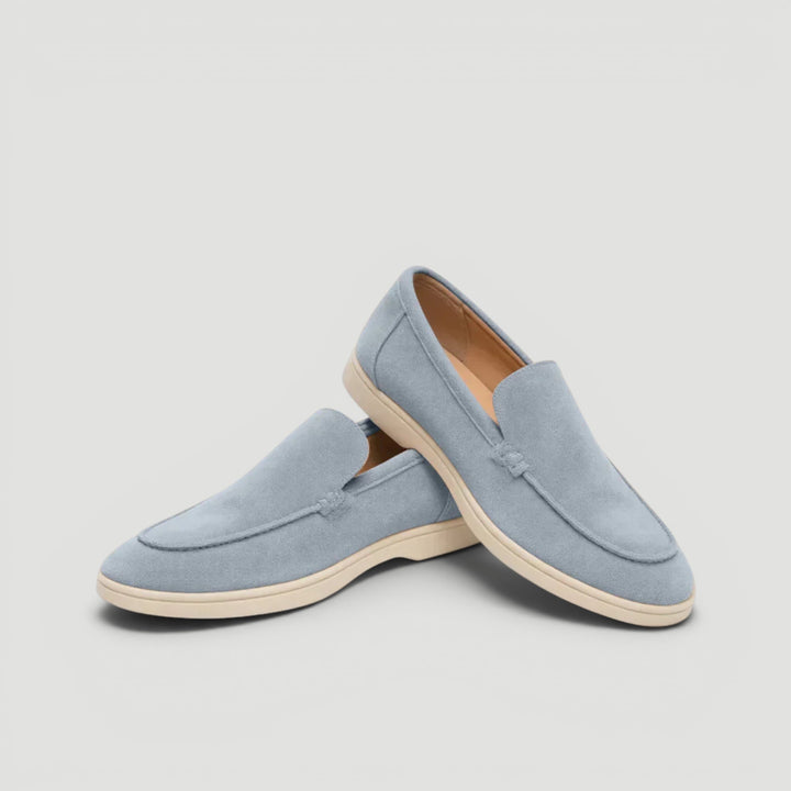 Detail shot of the breathable upper on men's slip-on loafers, ensuring summer comfort & style.