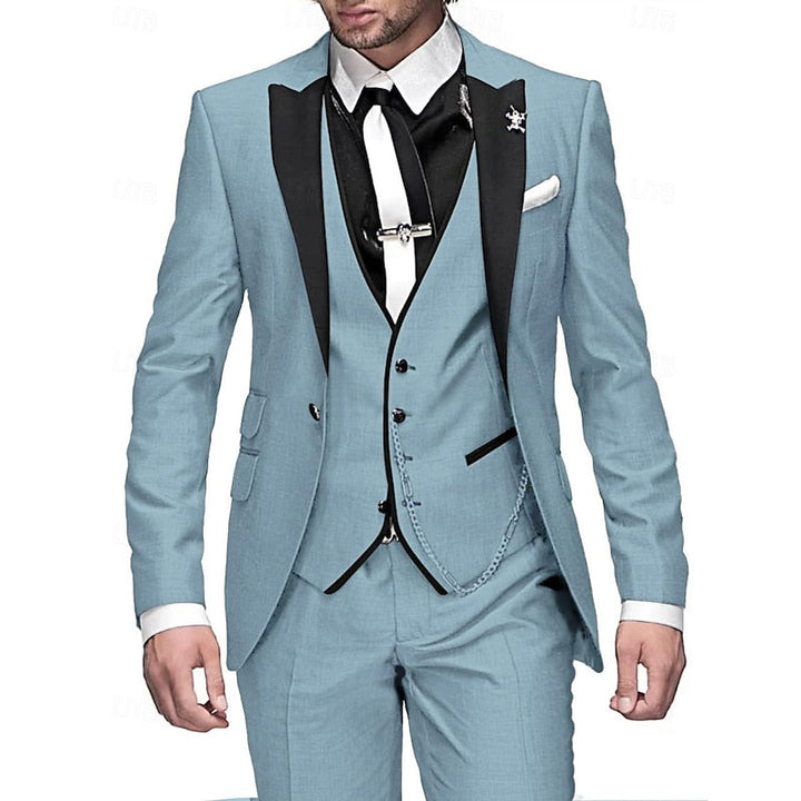Premium men's three-piece suit, tailored for comfort & style. Features a sharp blazer, vest & matching trousers.