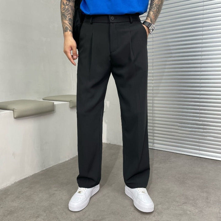 Contemporary men's wide-leg pleated trousers, perfect for office workwear, business meetings, or elegant events.