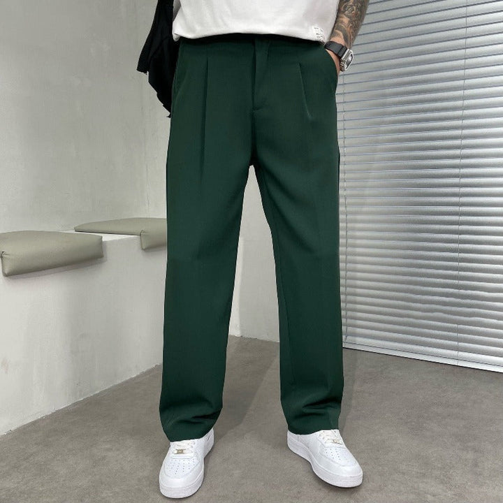 Sophisticated men's pleated wide-leg trousers, ideal for elevating any smart casual or formal men's fashion ensemble.