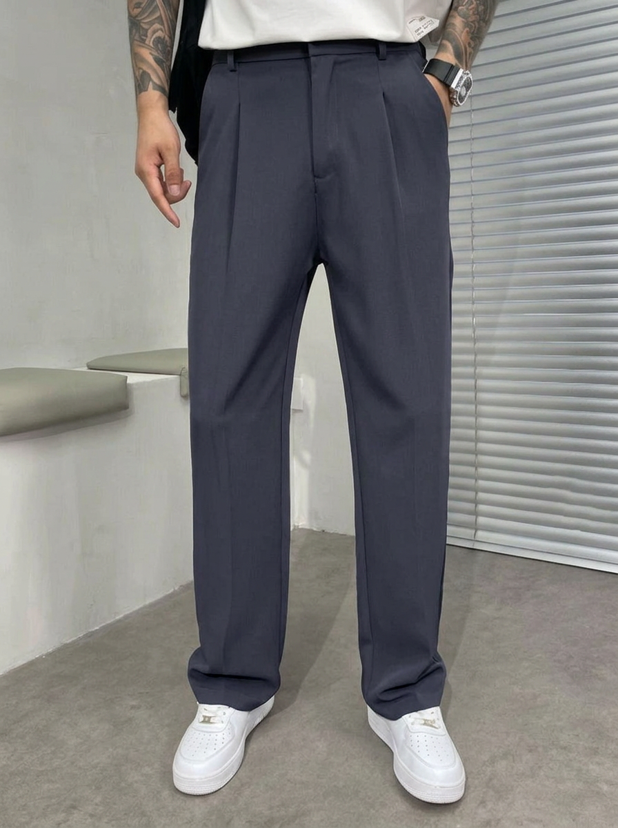 Classic yet modern men's wide-leg dress trousers with a tailored pleated front, merging comfort with elegant style.