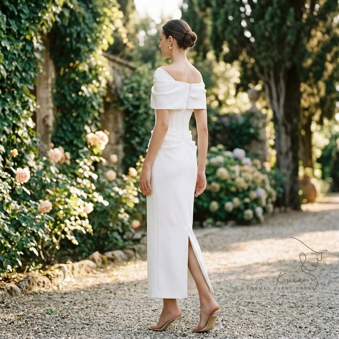 Sleek formal mermaid silhouette dress with pleated details, ideal as a wedding guest or prom dress.