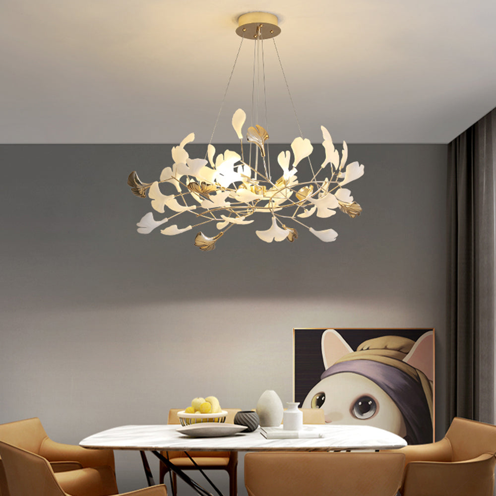Decorative Merrlian chandelier, gold & white, brings modern elegance to dining areas.