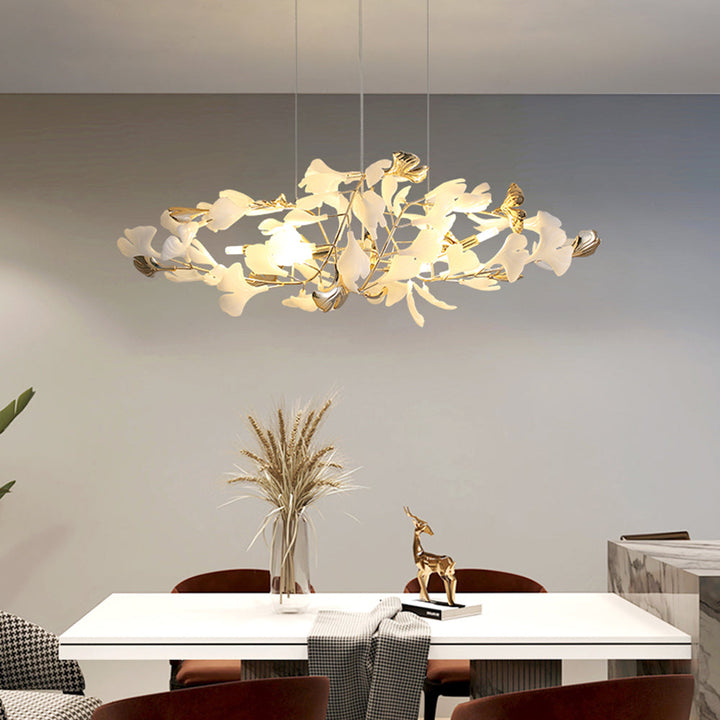 Sculptural Merrlian gold & white chandelier, a modern LED fixture for any space.