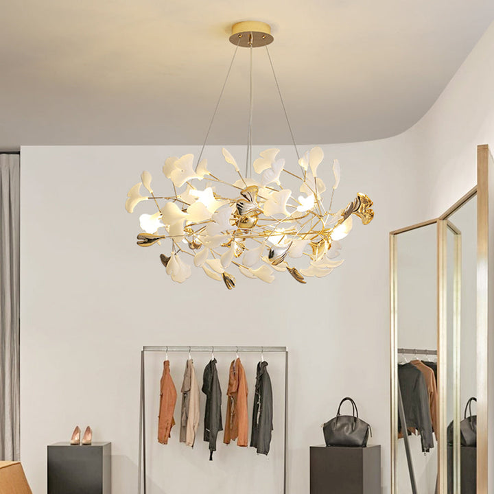Stylish Merrlian LED pendant light, gold & white, perfect for elegant home decor.
