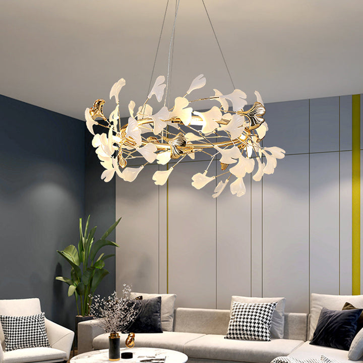 Merrlian sculptural pendant light, modern gold & white design, illuminates living rooms.
