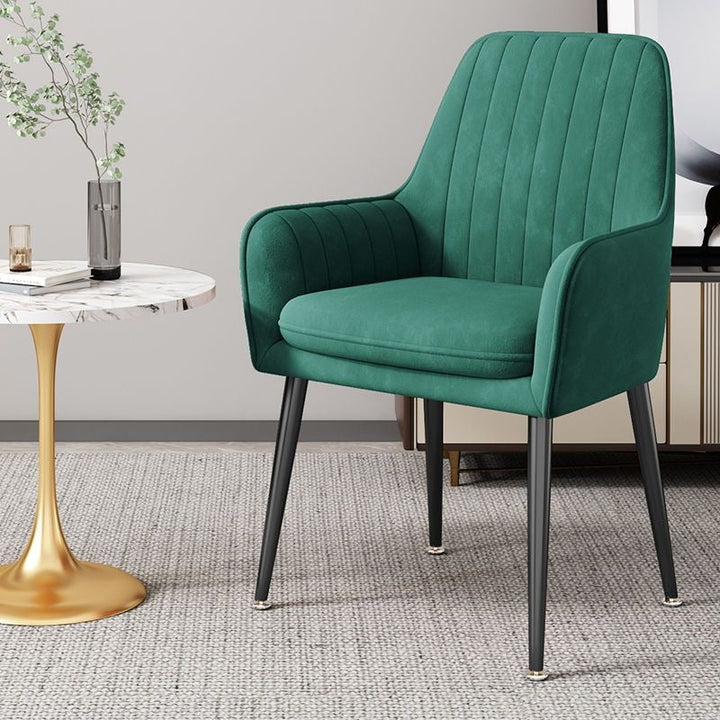 Comfortable and elegant accent chair with unique gold-finished legs.
