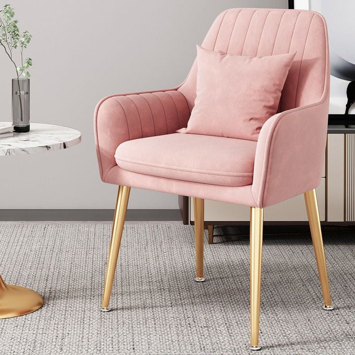 Gold leg accent chair, modern design, offering stylish comfort for any space.