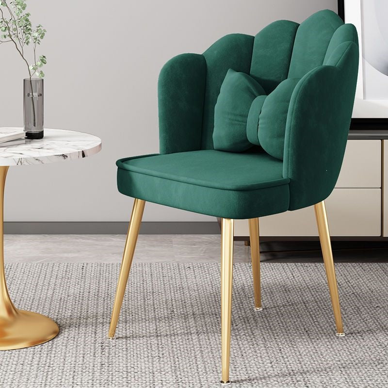 Space-saving accent chair with stylish gold legs for flexible home decor.