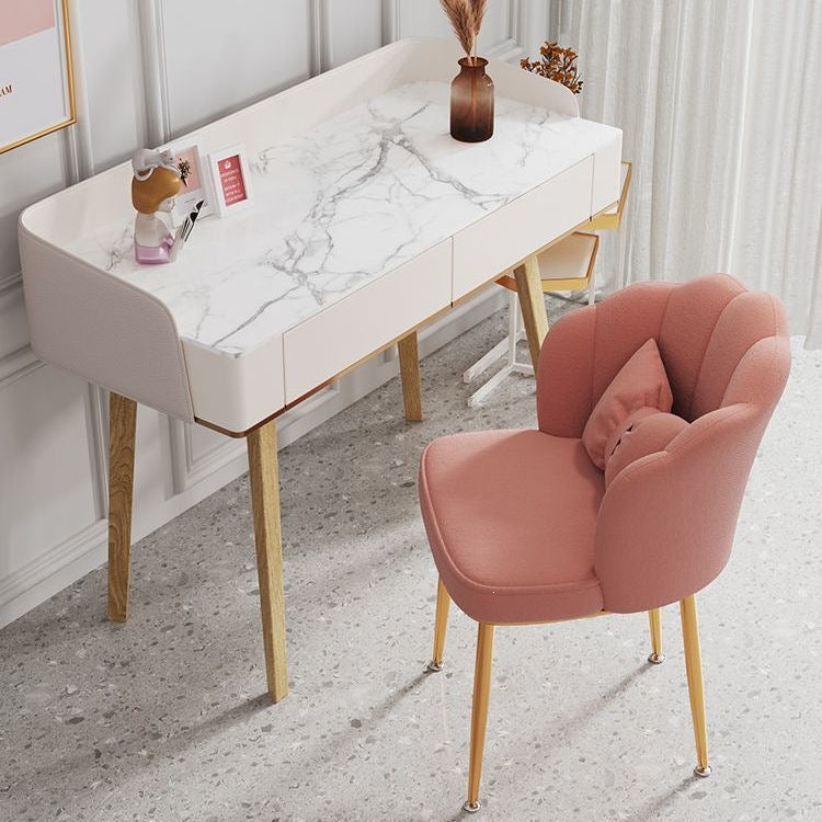 Compact modern living room chair with golden legs, ideal for small spaces.