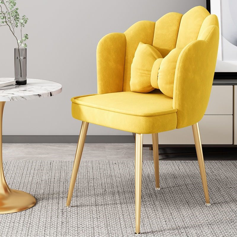 Elegant gold leg accent chair, a statement piece for modern interiors.