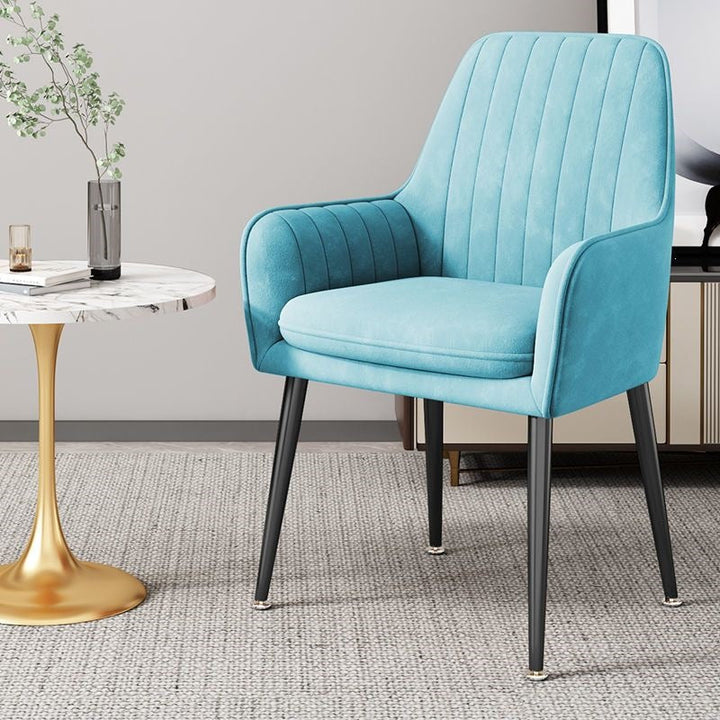 A chic modern accent chair with elegant gold legs, suitable for any room.