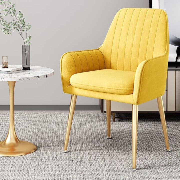 Experience comfort with this modern accent chair & stylish gold legs.