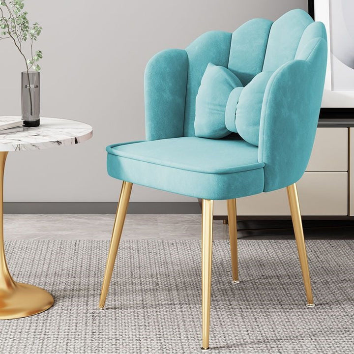 Versatile accent chair, modern style, gold legs, a cozy addition to any space.