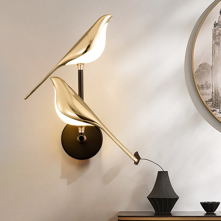 Decorative modern LED wall lamp with unique bird design, offering elegant magnetic lighting for homes.