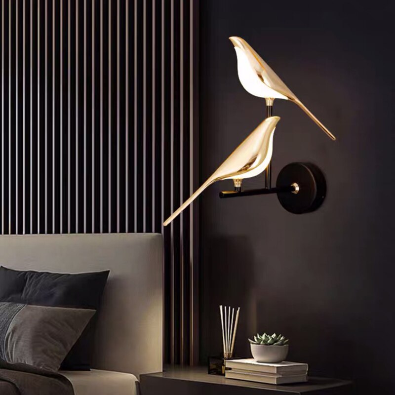 Artistic bird LED wall lamp for modern bedroom lighting. Elegant and decorative home accent.