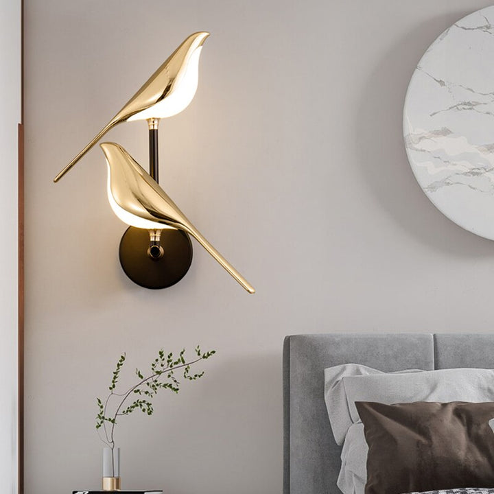 Contemporary LED wall lamp featuring a sleek bird design, enhancing modern home decor with ambient light.