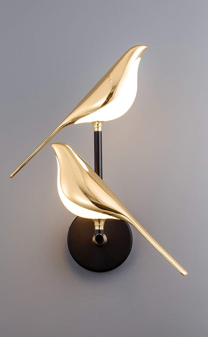 Innovative magnetic modern bird wall lamp with LED light, an elegant decorative piece for any room.
