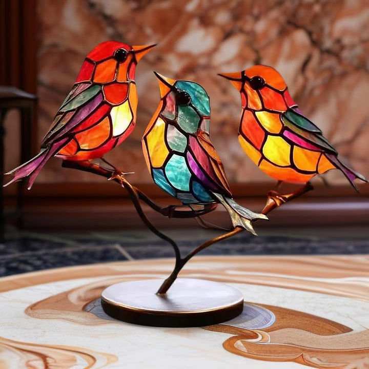 Sophisticated glass bird art. Modern table sculpture with colorful design, an elegant home accent.