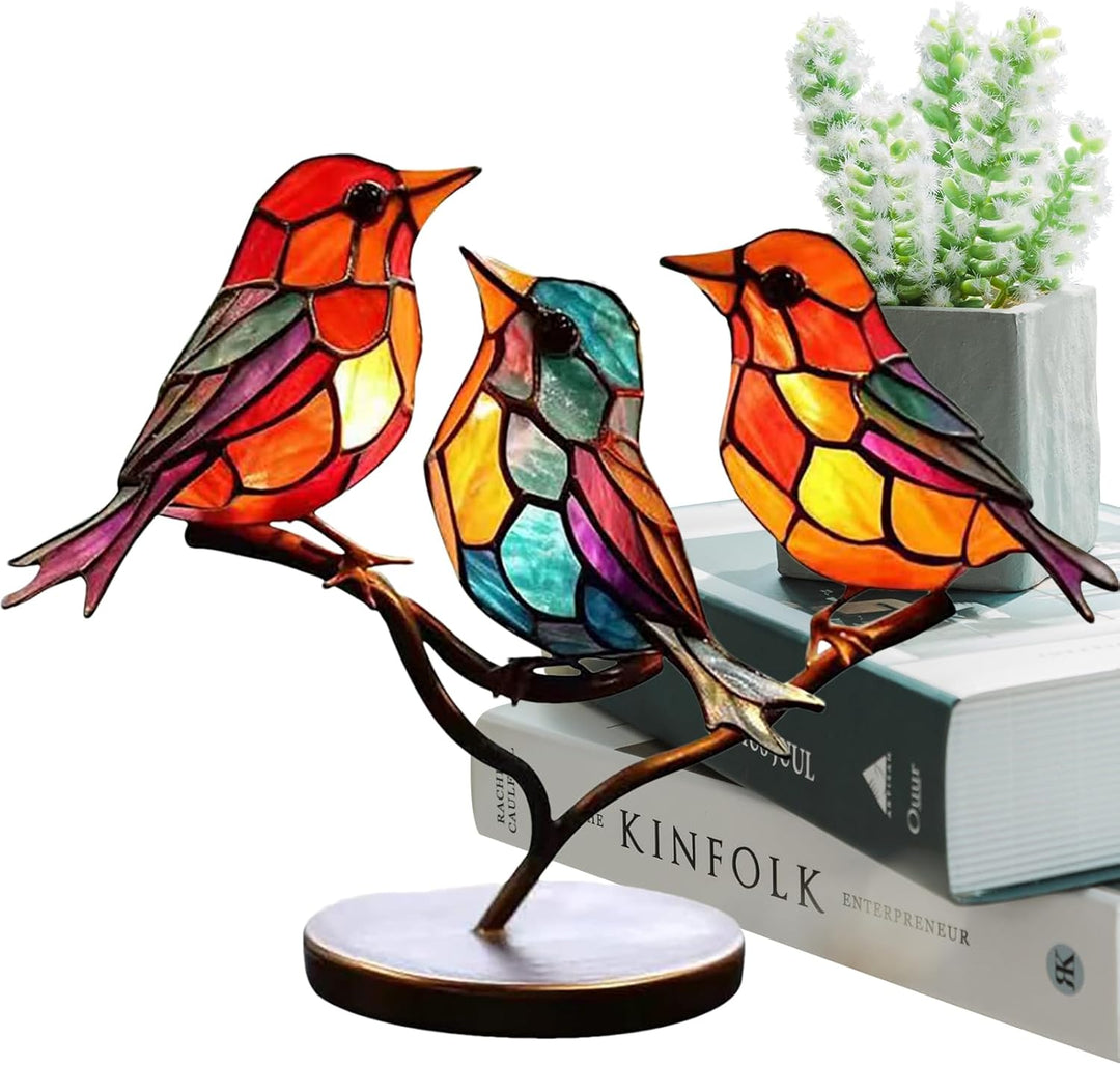 Glass bird table ornament. Modern art sculpture with vibrant colors, an elegant home decor piece.