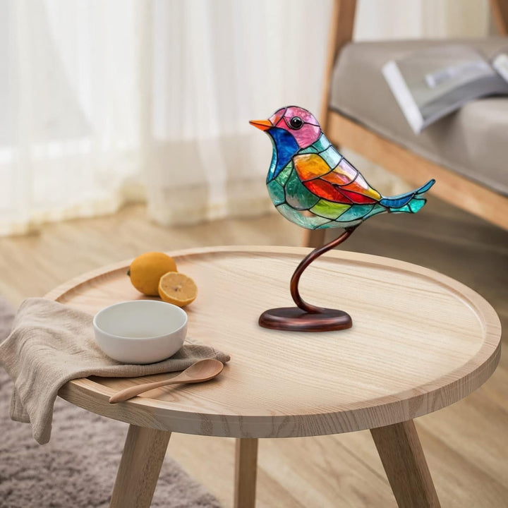 Nature-inspired glass bird figurine. Modern decorative table art with vibrant colors.