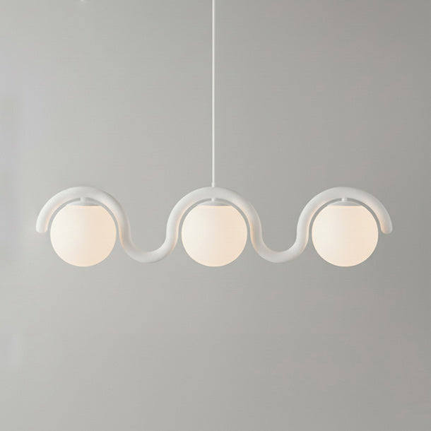 Modern linear chandelier, long and striking.
