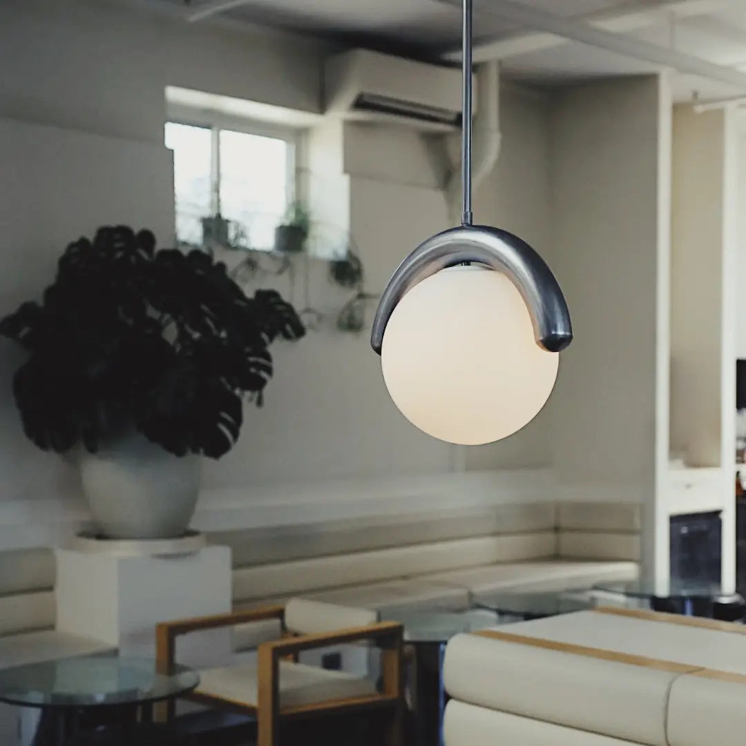 Modern linear ceiling light, black metal, dining.