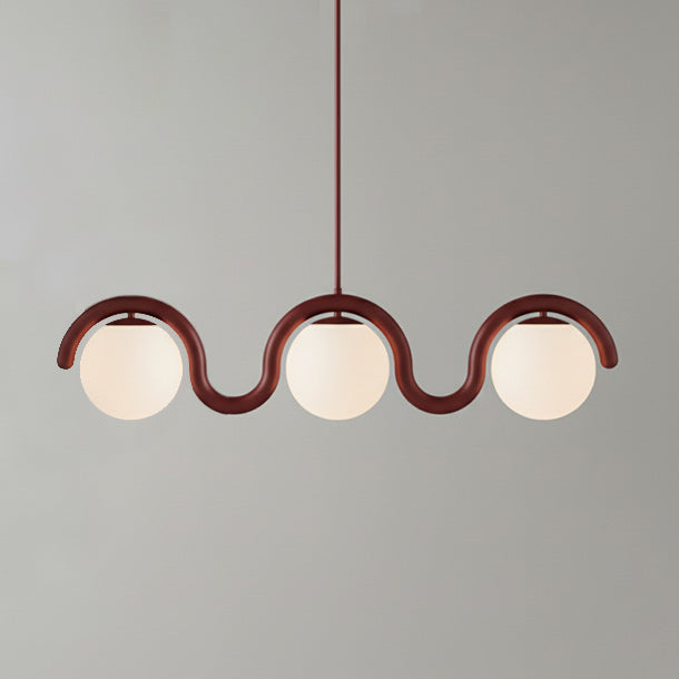 Modern linear ceiling light, sleek glass accents.
