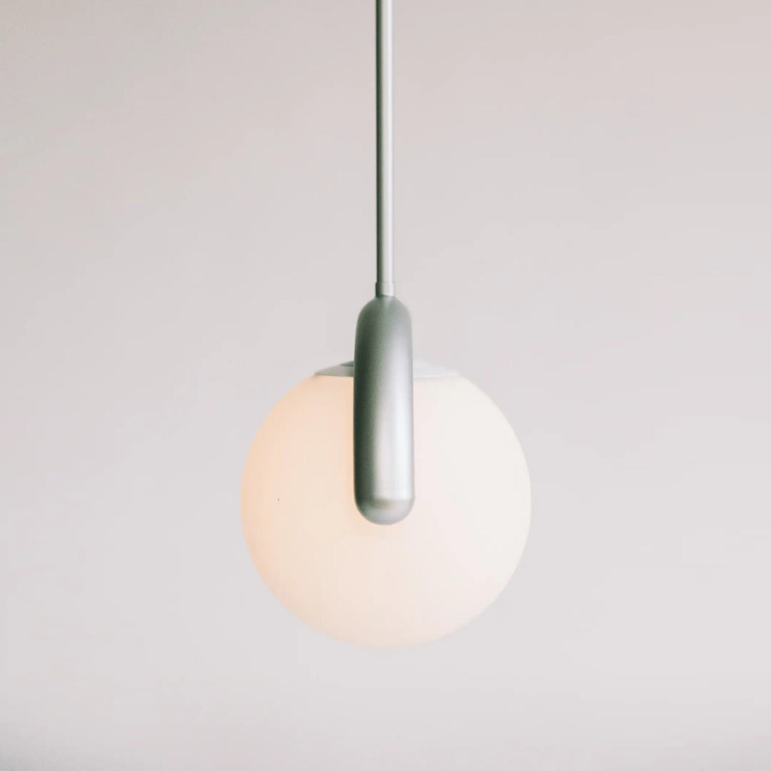Stylish linear pendant, versatile dining room use.