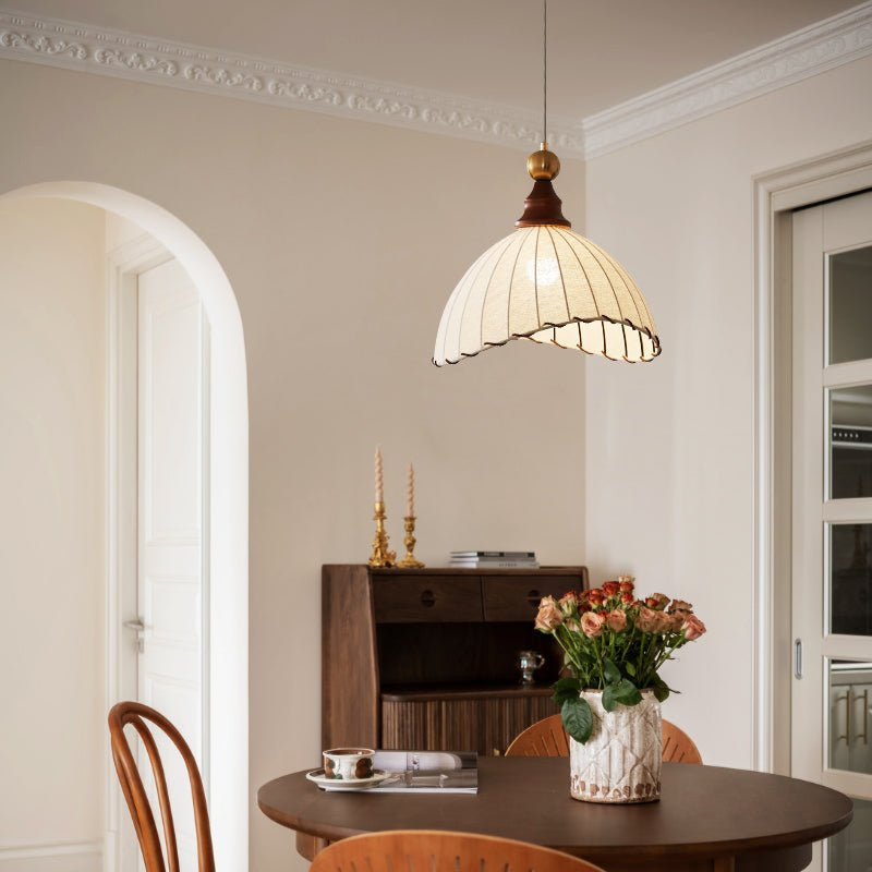Modern ceiling lamp, fabric shade, gold accent, wood details – adds timeless elegance to any room.