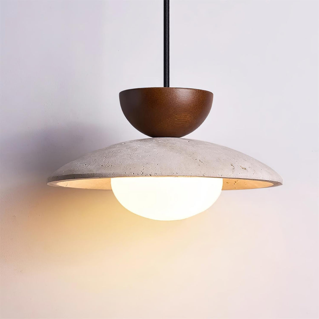 Sophisticated pendant lighting fixture combining smooth travertine with rich wood accents for living rooms.