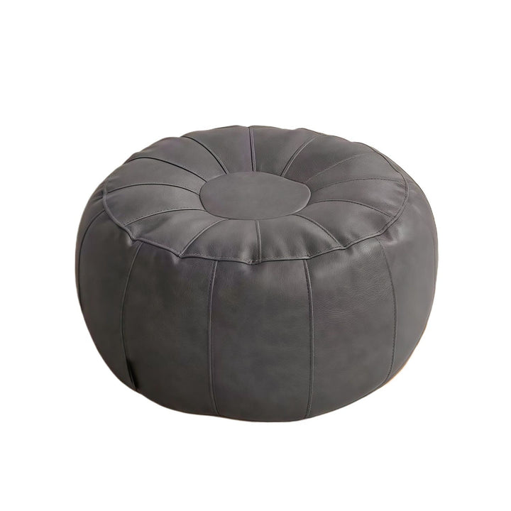 Elegant modern round stool with stylish comfort, perfect accent furniture for living room or bedroom decor.