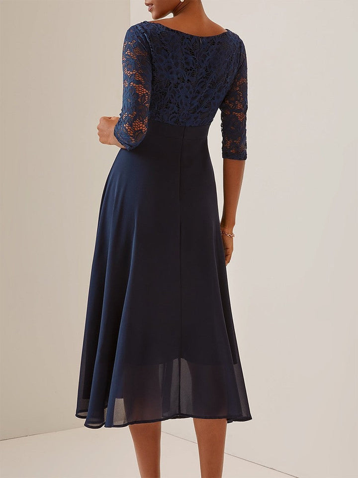 Women's flattering navy blue lace midi dress with sleeves, ideal for cocktail parties & evening special occasions.