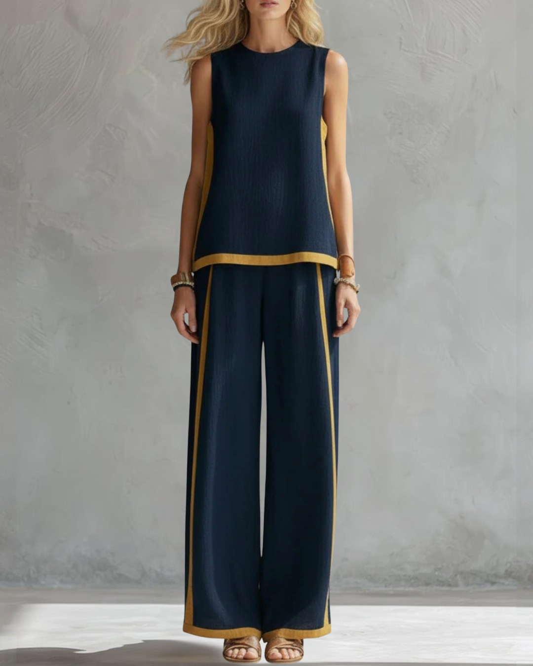Navy blue elegant sleeveless set with wide-leg trousers. A comfortable and chic co-ord for various occasions.