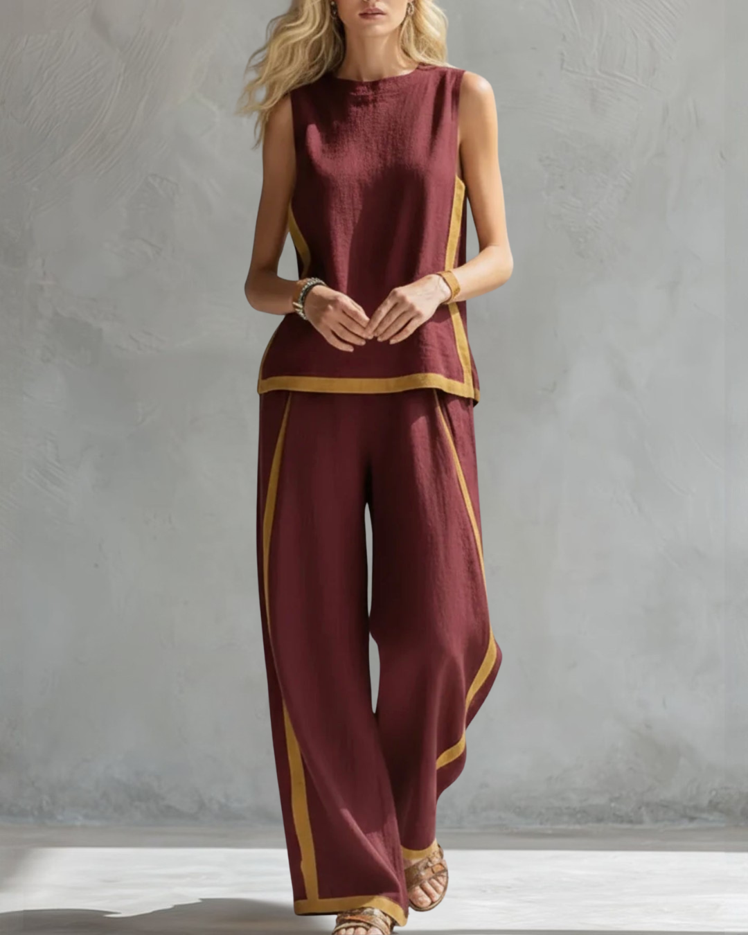 Wine red elegant women's sleeveless top and wide leg pant set. Chic and versatile for both casual & office.