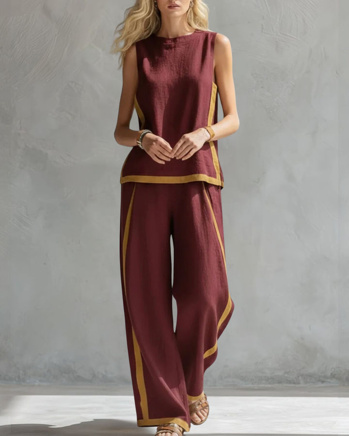Wine red elegant women's sleeveless top and wide leg pant set. Chic and versatile for both casual & office.