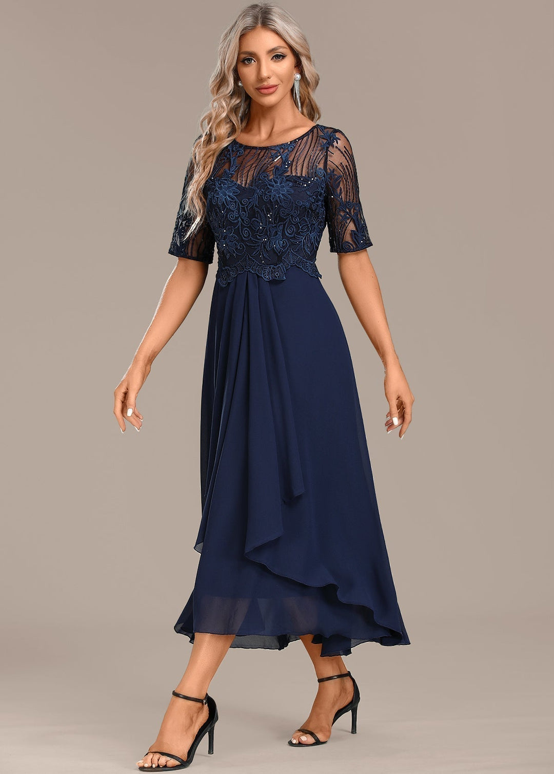 Women's formal navy midi dress with delicate lace detailing, perfect for elegant parties.