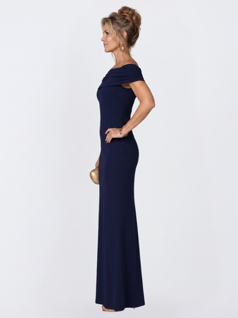 Black off-shoulder bodycon maxi dress with a sophisticated twist-back detail, ideal for party & evening wear.